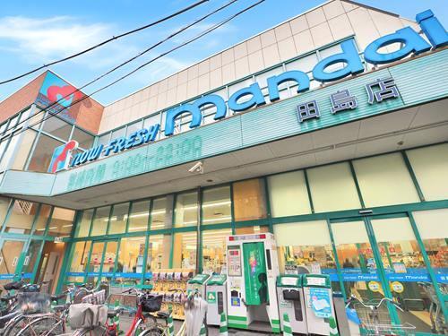 万代田島店 390m