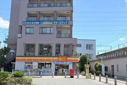 デイリーヤマザキ上牧駅前店まで230ｍ