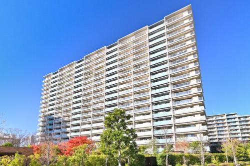 ブルームコート外観写真（3棟構成、全864戸の大規模マンション）