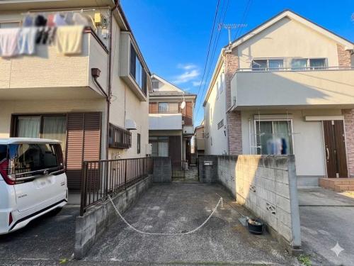 外観：写真中央奥野建物