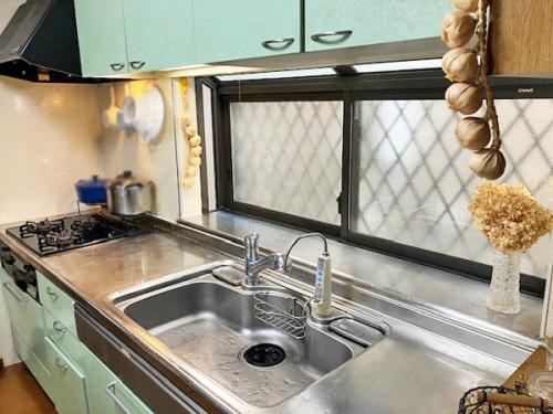 ワークトップが使いやすくパステルグリーンが爽やかなキッチンです！