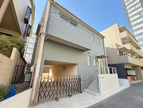 1階約57.40㎡、2階約57.40㎡。土地面積約112.48㎡。